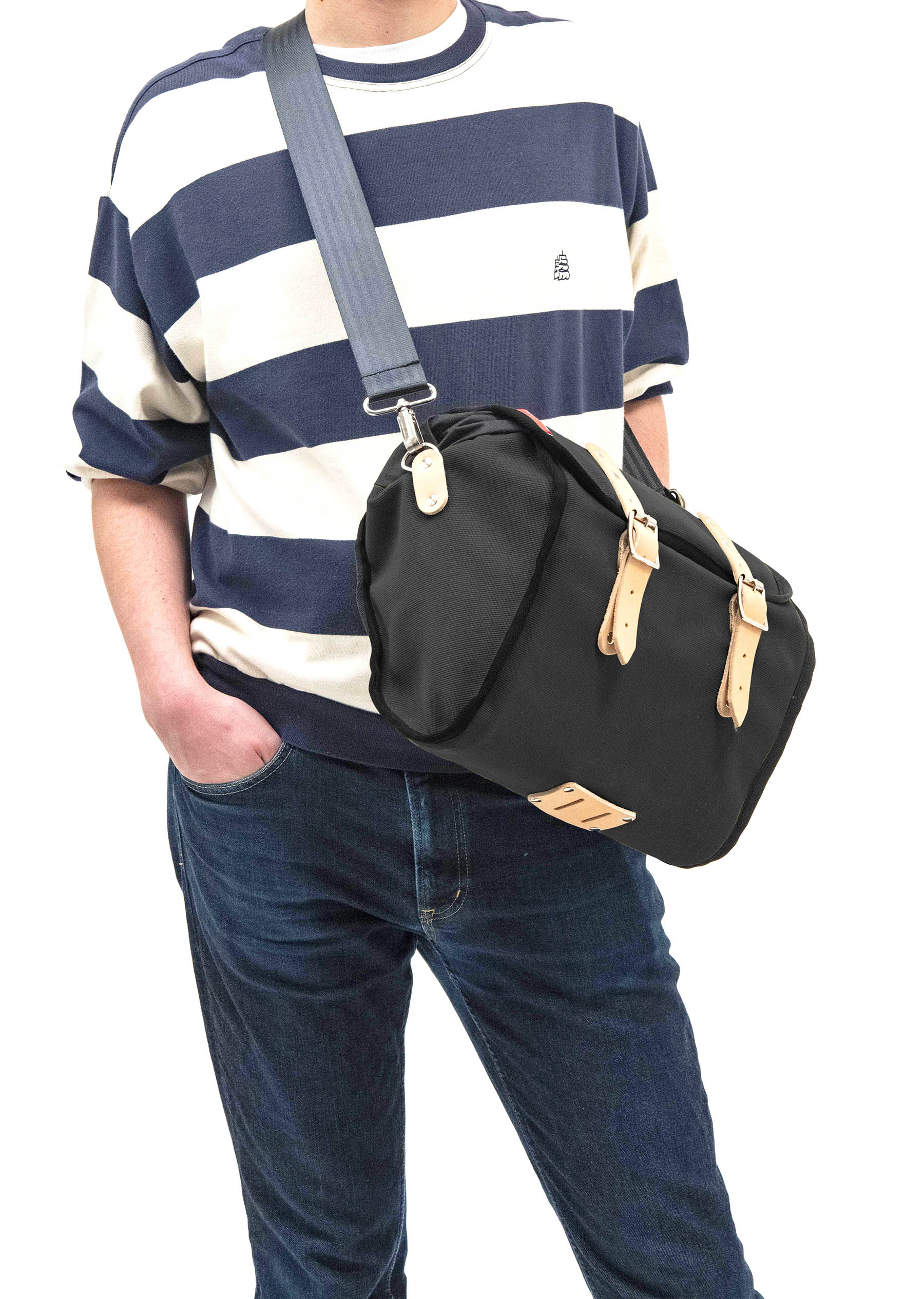 Model wearing the Frost and Sekers Saddle bag using the included shoulder strap