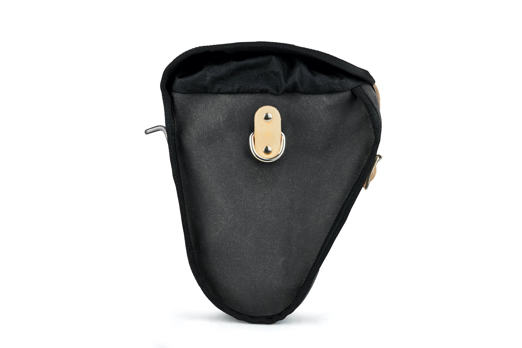 Side view showing expandable capacity of Frost and Sekers Marvin saddle bag. Black canvas with tan leather.